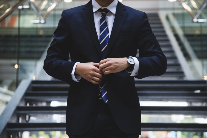 consultant standing near the stairs