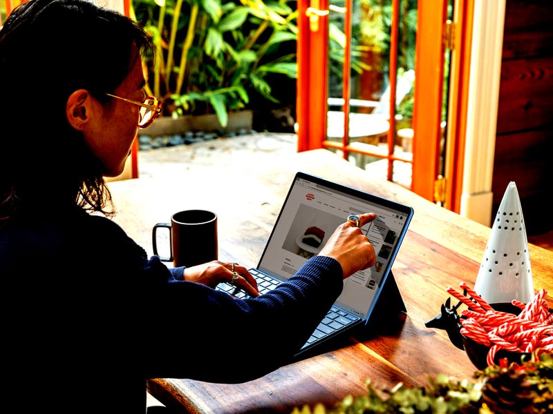 a woman using a laptop