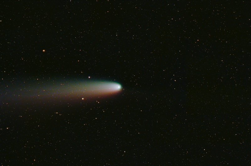 A black and white photo of a bright object in the sky